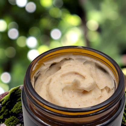 Natural Gypsy Apricot Glow Facial Scrub in an amber glass jar with a creamy, textured exfoliating formula.